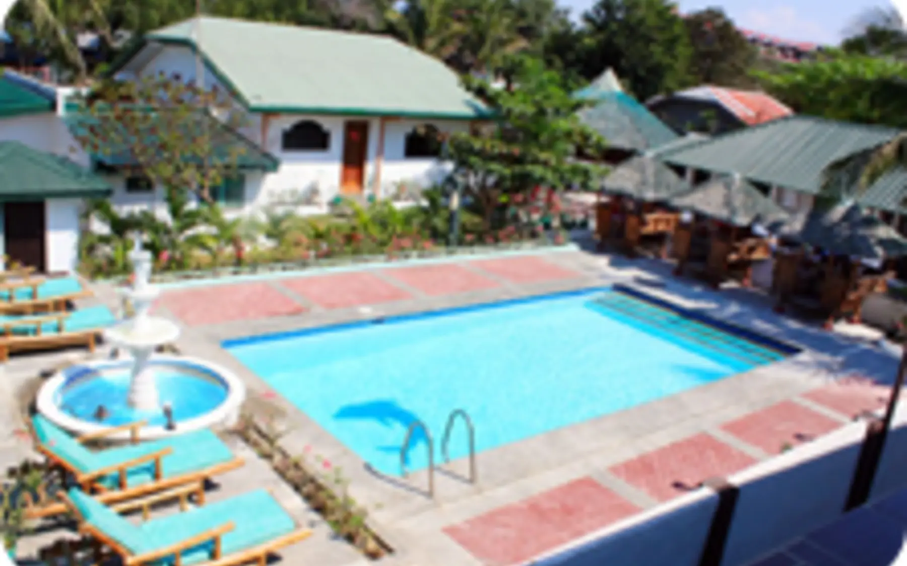 Outdoor pool and cottages